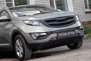 Изображение Решетка радиатора Kia Sportage 2011 с черной сеткой  (1 поперечина) Вариант 2